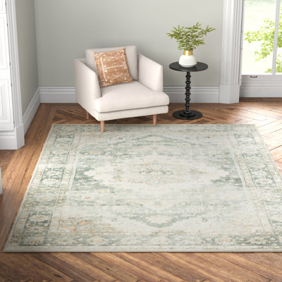 Tapis oriental bleu sarcelle / ivoire