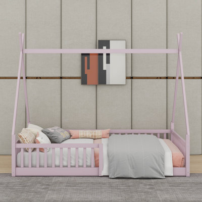 Lit simple en bois avec clôture