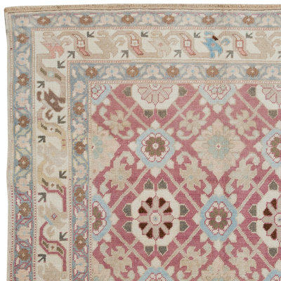 Tapis turc rétro unique fait à la main avec des couleurs douces