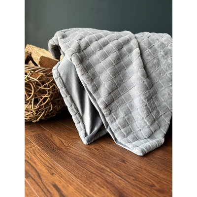 Remedio Throw Blanket