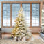 Sapin de Noël élégant enneigé avec lumières-648887276