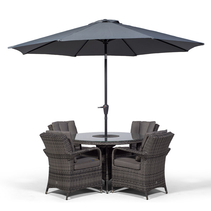 Karas 4 - Person Wicker Patio Dining Set with Round Table , Cushions Included, Grey
