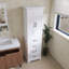 Meuble-lavabo autoportant avec 2 portes à charnières, 3 tiroirs, tablettes réglables, poignées en fer noir, stratifié PB durable et panneau de fibres à densité moyenne