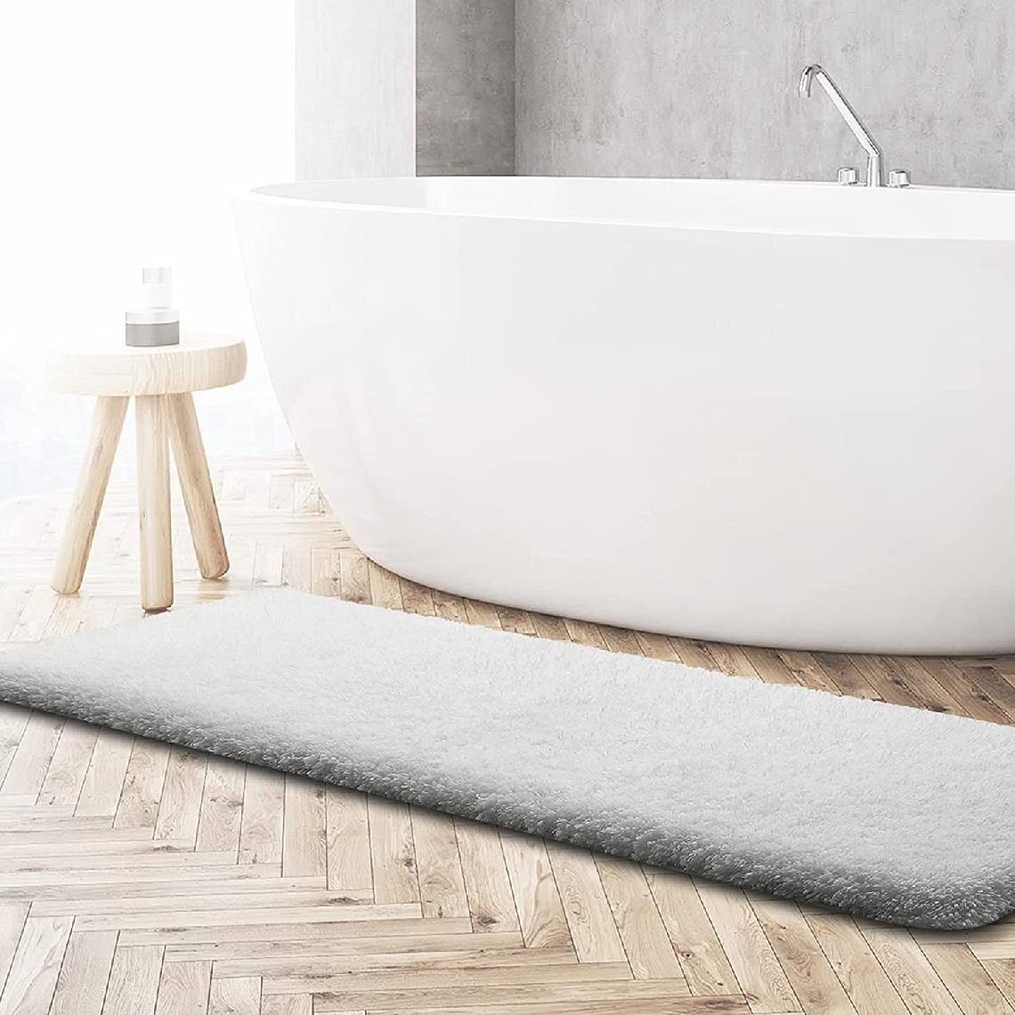 https://assets.wfcdn.com/im/46453195/compr-r85/1626/162678687/flickinger-microfiber-bath-rug-with-non-slip-backing.jpg