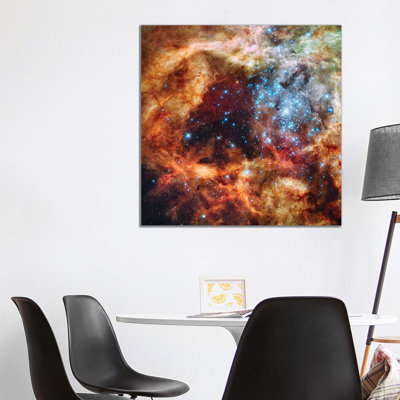 A Stellar Nursery Known As R136 In The 30 Doradus Nebula by Stocktrek Images - Wrapped Canvas Print