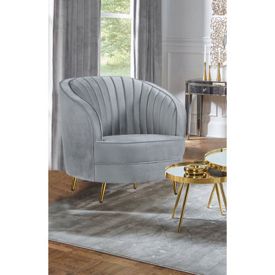 Chaise capitonnée grise et dorée
