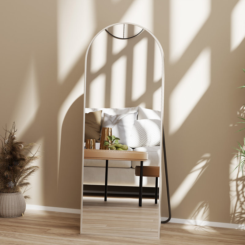 Miroir sur pied arqué