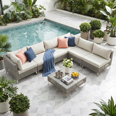 Ensemble de conversation modulaire d'extérieur en osier 7 pièces, canapé modulaire de patio avec coussins beiges épais résistants à l'eau et table basse pour porche de jardin