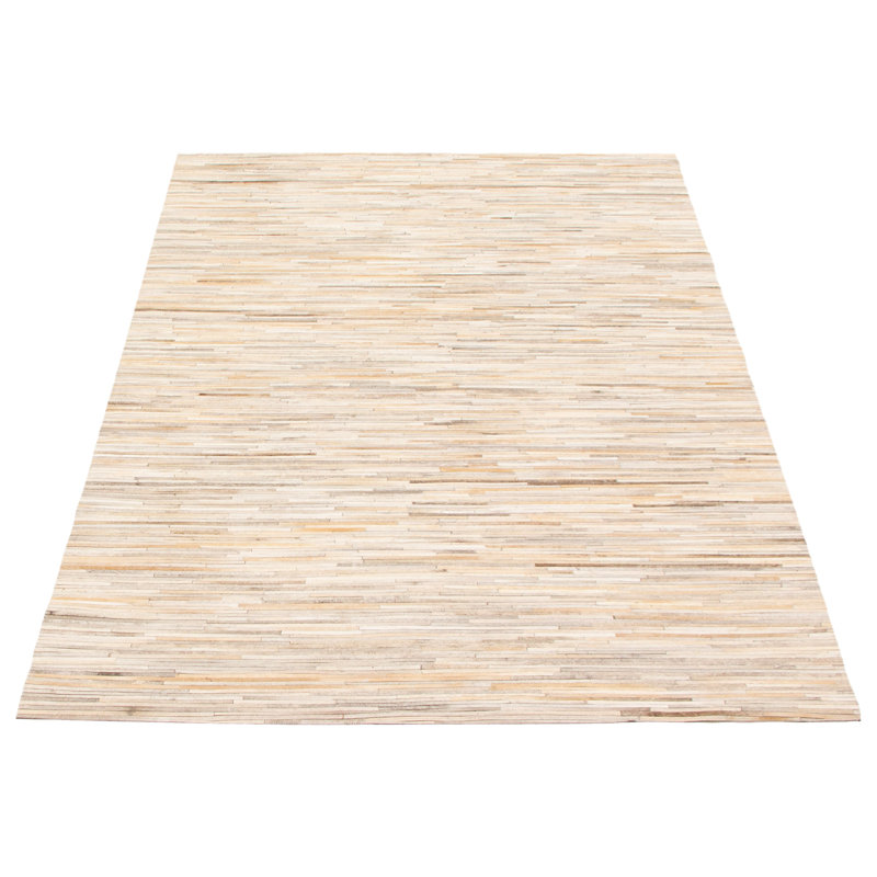 Tapis ivoire en cuir de vache fabriqué à la main Arunas