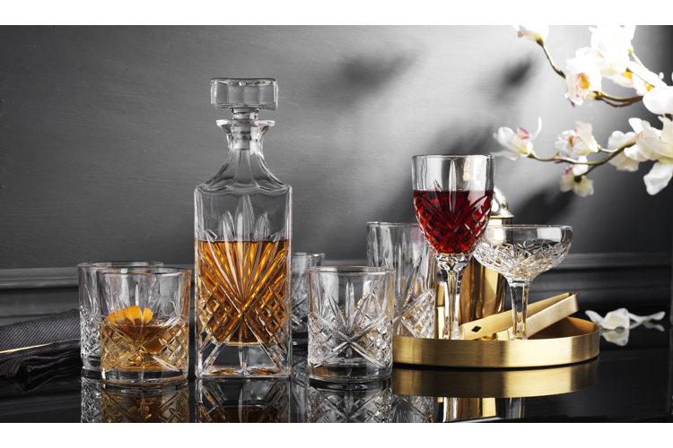 detailed glass carafe set including carafe, whiskey, and wine glasses