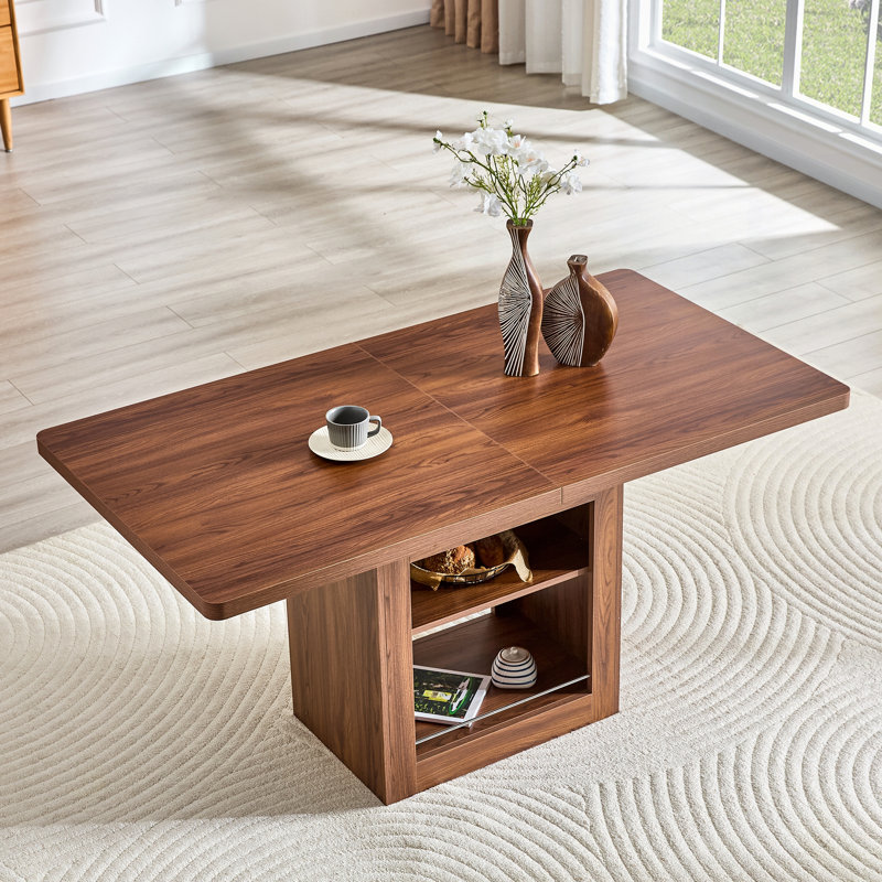 Table de salle à manger extensible en noyer avec rangement pour des sièges polyvalents et une utilisation efficace de l'espace dans les cuisines modernes.