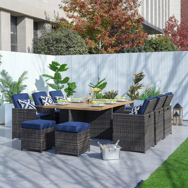 Jarhia 10 - Person Wicker Patio Dining Set with Rectangular Table , Cushions Included, Brown, Blue
