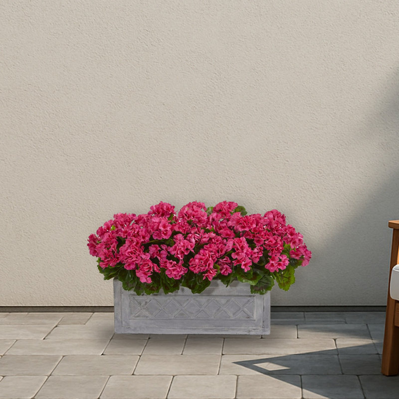 Geranium plante artificielle en pot de pierre
