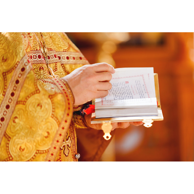 Prayer Book In Hands Of The Priest. Orthodox Christian Church - Wrapped Canvas Print, 30cm H x 46cm W x 3.8cm D