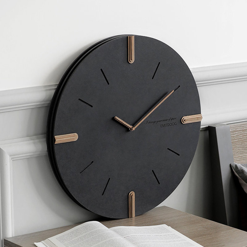 Horloge murale noire minimaliste et ronde pour salon