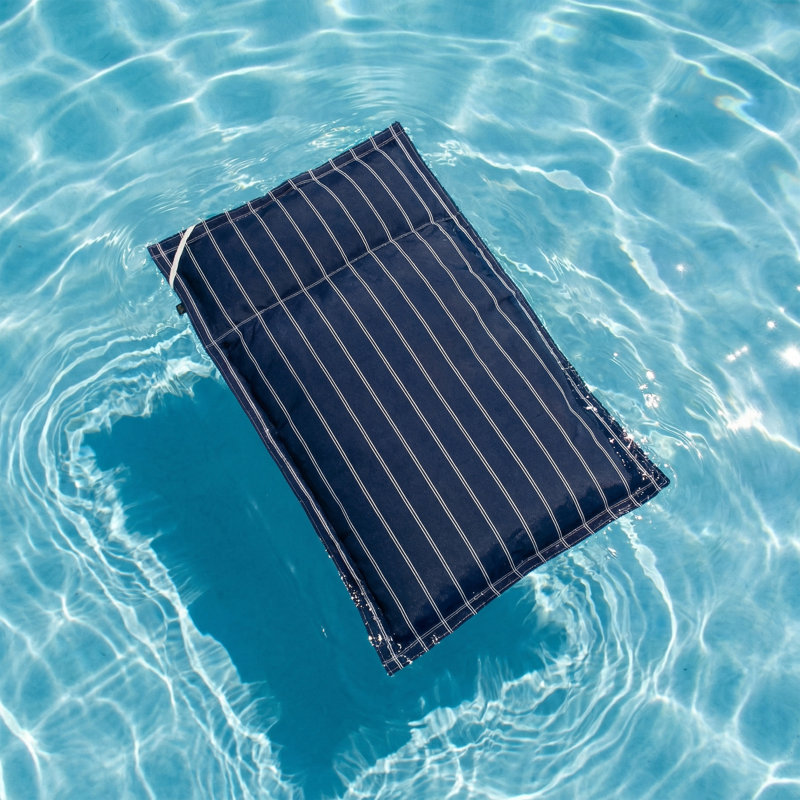 Sunbrella - piscine flottante bleu marine avec coussin