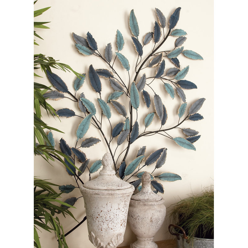 Décoration murale feuille de métal bleu avec tiges noires