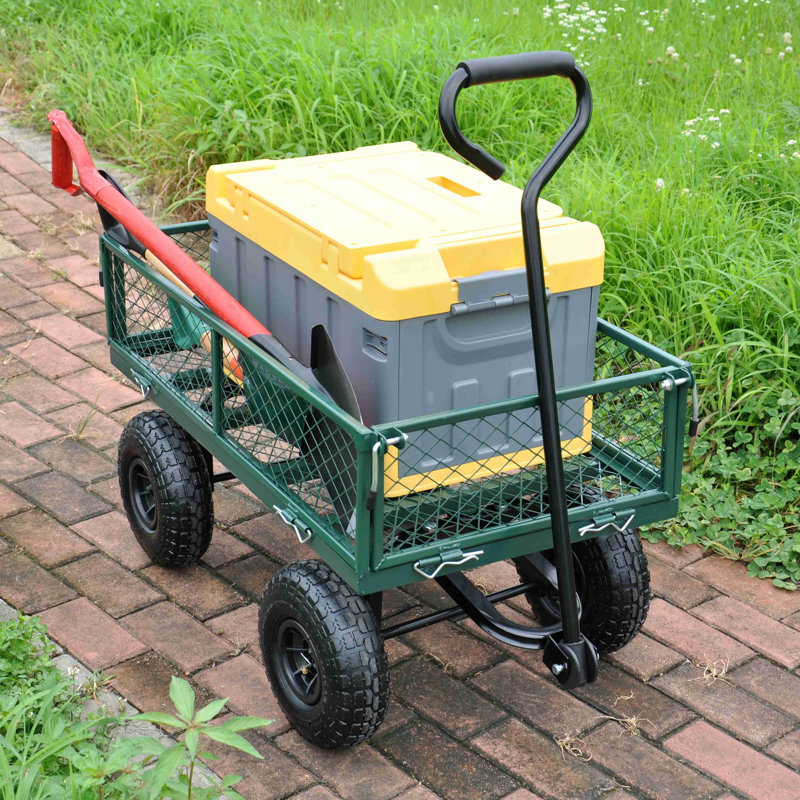 Les chariots de chariot de jardin facilitent le transport du bois de chauffage, Vert