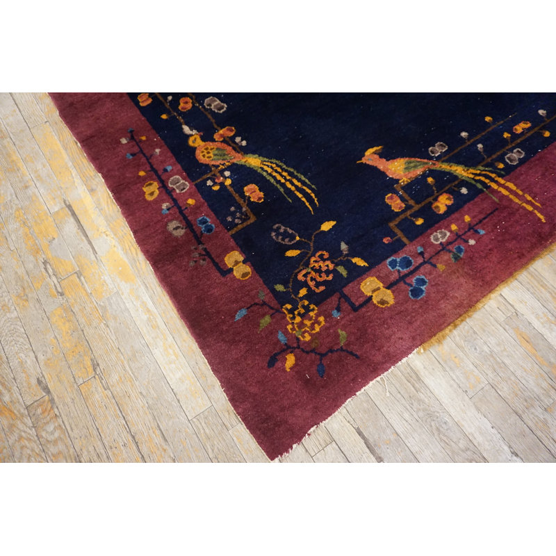 Tapis bleu antique en laine à motif oiseau minimaliste