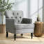 Fauteuil club capitonné