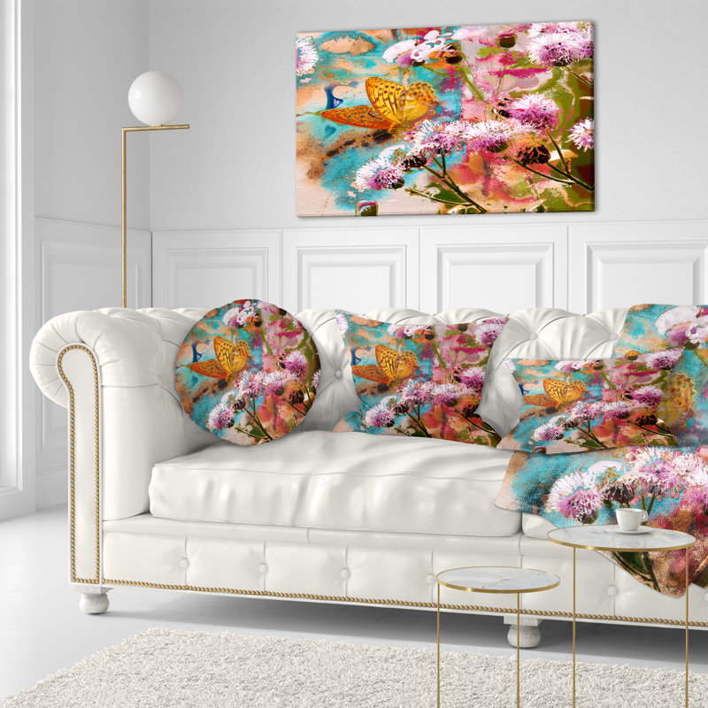 Coussin lombaire floral sur les fleurs thistle