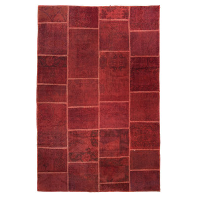 Tapis rouge en laine noué à la main