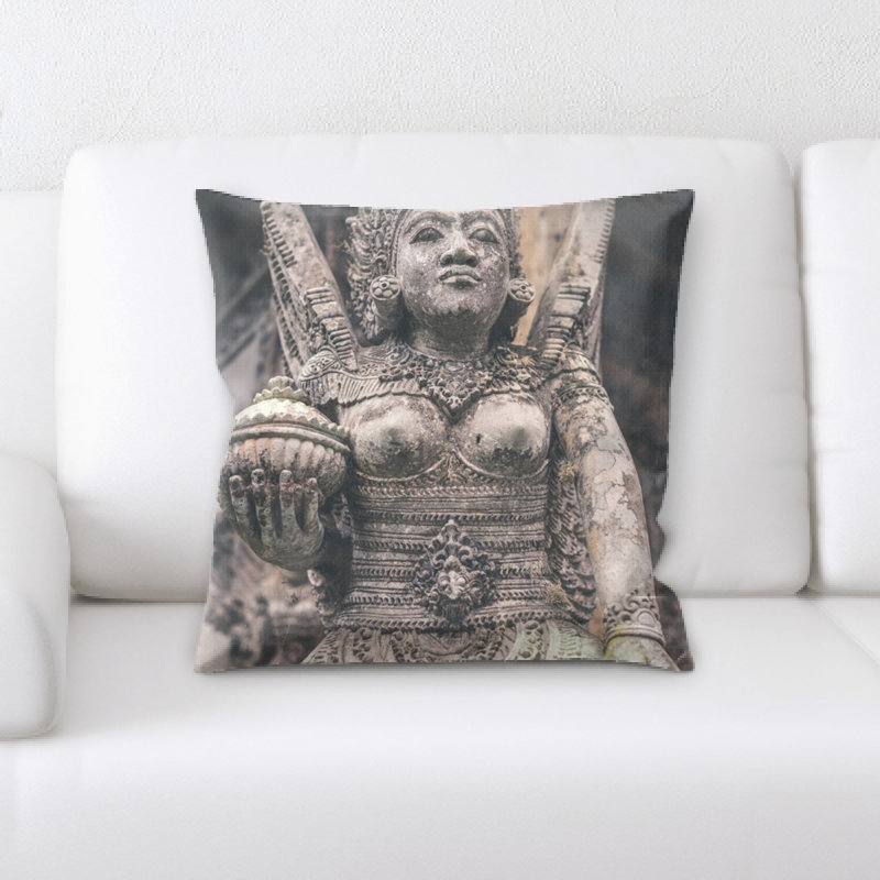 Coussin statue