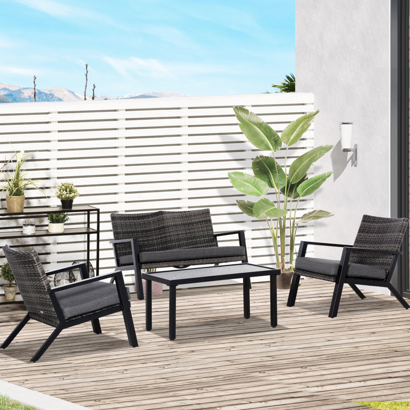 Ensemble de jardin 4 pièces comprenant 2 fauteuils et une table basse, sièges confortables pour la piscine, mobilier de patio noir idéal pour les réceptions dans le jardin.