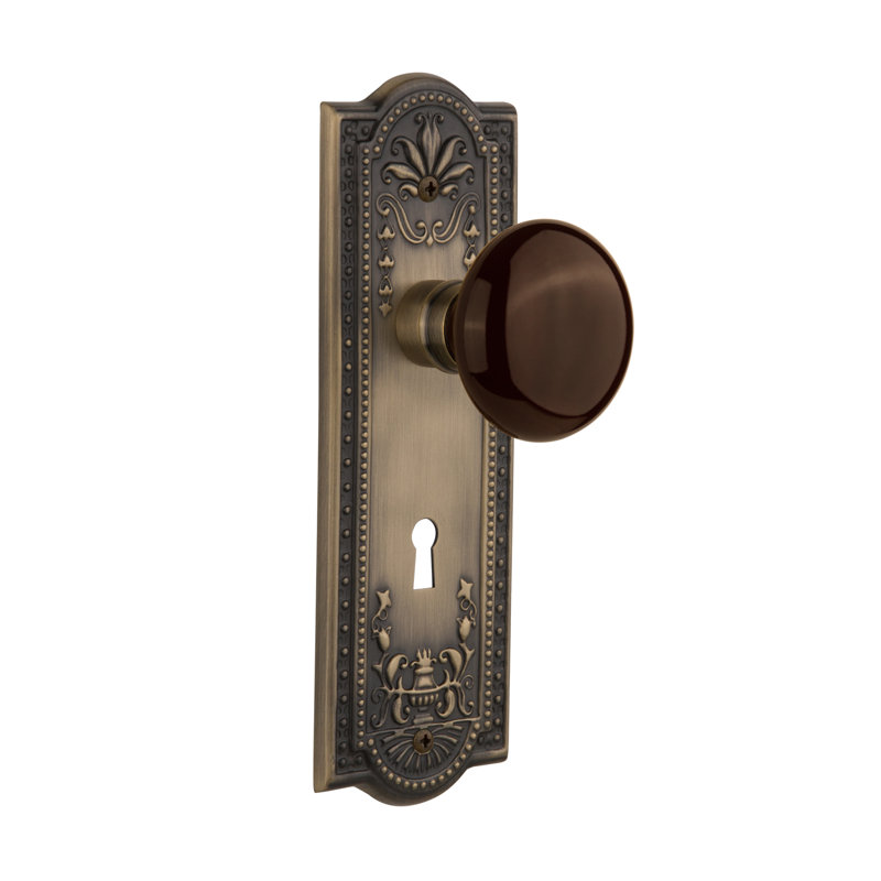 Meadows Plate with Decorative Keyhole and Brown Porcelain Door Knob, 2-3/4”, Antique Brass