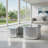A Modern, Luxurious Silver Mirrored Coffee Table That Complements Contemporary Home Décor And Adds A Touch Of Sophistication To The Sofa Area.