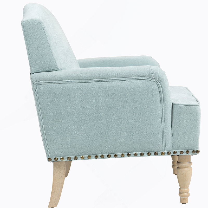 Fauteuil rembourré confortable et durable avec pieds en bois rétro et garniture cloutée, idéal pour divers espaces de vie