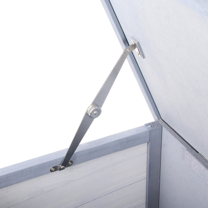 Chenil en bois gris avec toit imperméable