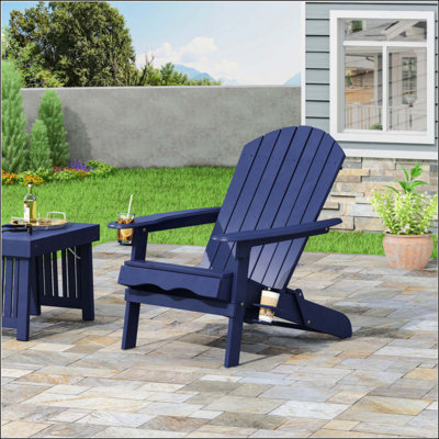 Chaise Adirondack pliante confortable avec porte-gobelets, parfaite pour les expériences de détente en plein air et le charme rustique.