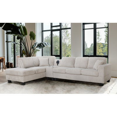 Canapé modulaire réversible en fausse fourrure Vega avec console média