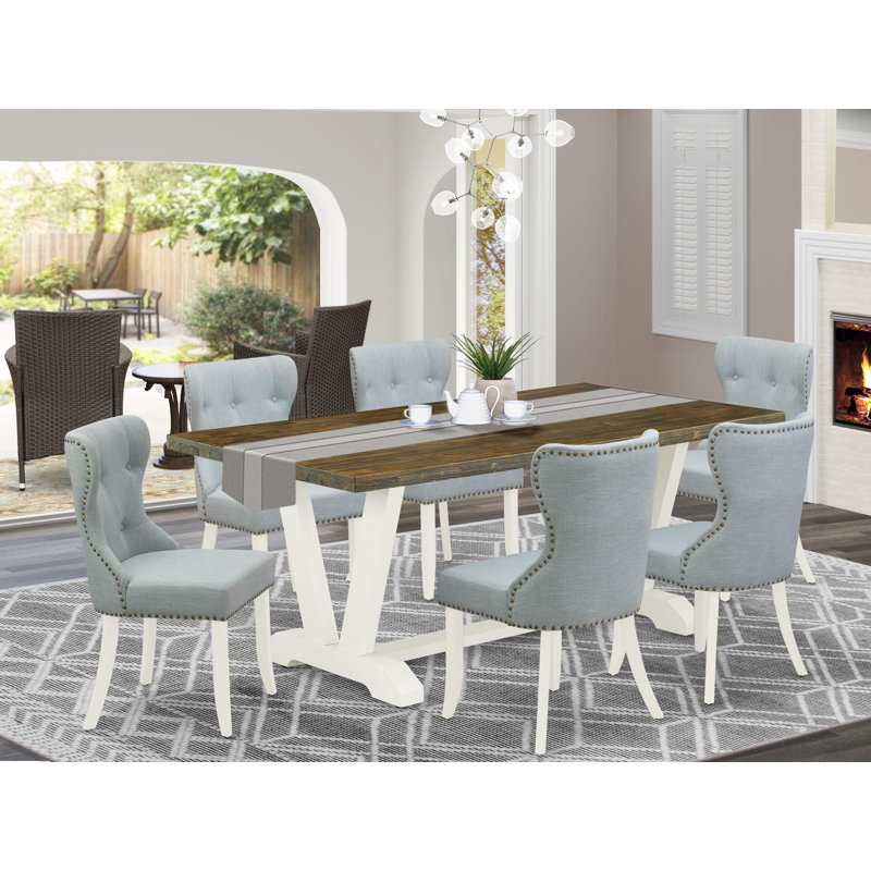 Cet ensemble de salle à manger 7 pièces comprend une table rectangulaire Jacobean patinée et 6 chaises de cuisine en lin bleu bébé avec dossier capitonné - Lin brossé blanc