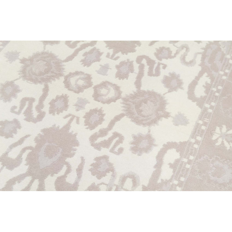 Tapis ivoire noué à la main de haute qualité