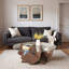 Table basse ronde avec plateau en verre et tablettes de rangement