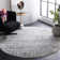 Riebe Abstract Ivory/Silver Area Rug