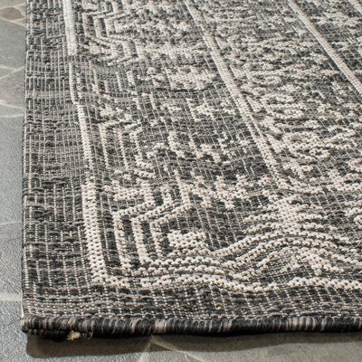 Mccoy Hooked Black/Beige Indoor/Outdoor Rug