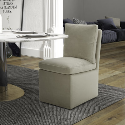 Chaise rembourrée Faouzi avec roulettes