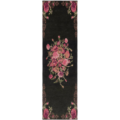 Tapis noir / rouge à motif floral Tammie