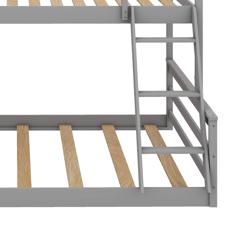 Lit superposé simple au dessus d'un lit double avec escabeau intégré pour une utilisation domestique