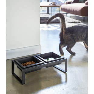 https://assets.wfcdn.com/im/46565627/resize-h310-w310%5Ecompr-r85/2323/232338256/yamazaki-home-steel-and-ceramic-pet-food-stand-2-bowls-for-food-and-water-tall-125-cups.jpg