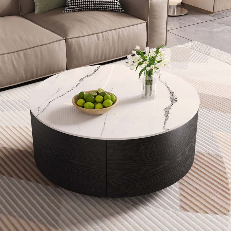 Table basse élégante à conception ronde avec roulettes, parfaite pour les petits espaces
