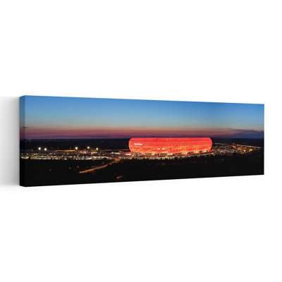 Soccer Stadium Lit Up At Dusk Allianz Arena Munich Bavaria Germany by Markus Lange - Wrapped Canvas Panoramic Print