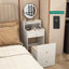 Meuble-lavabo compact polyvalent avec plusieurs options de rangement et tabouret élégant-579280903