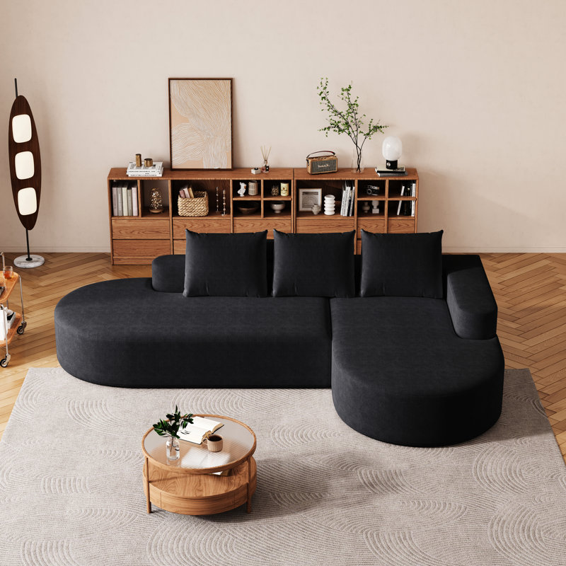 Élégant canapé arrondi en chenille haute résilience et assise très large pour une détente confortable