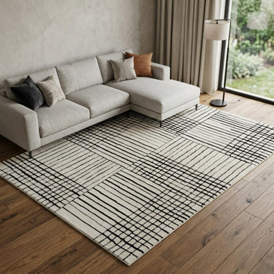 Tapis crème et noir 8 pi x 11 pi