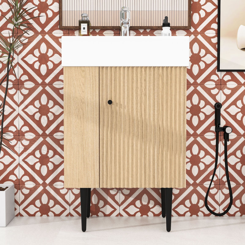 Meuble-lavabo élégant avec lavabo en céramique, rangement à gauche et détails dorés, Bois / noir