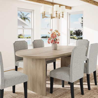 Ensemble de table de salle à manger de style campagnard ovale de 63 pouces avec chaises rembourrées en faux lin, table en placage de bois aggloméré pour la salle à manger et la cuisine